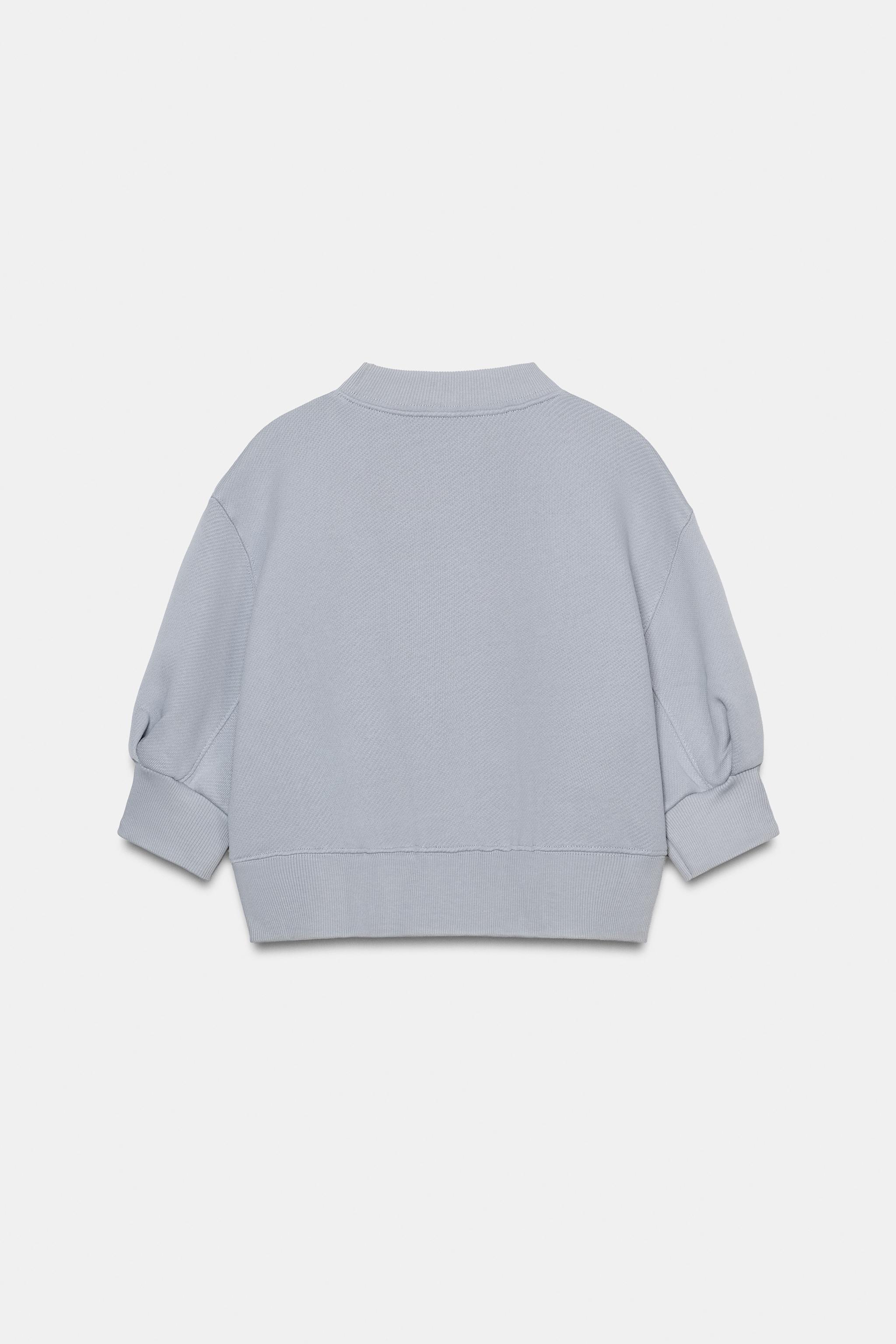 VOLUME CROPPED SWEATSHIRT
